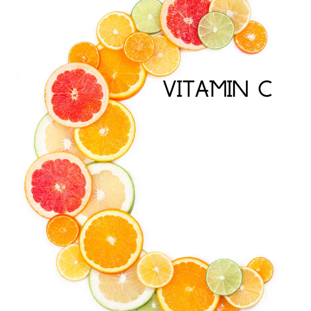 Sliced citrus fruits arranged in a circular pattern with 'Vitamin C' text on a white background.